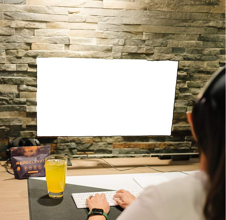 Streamer at a desk with an ERO sponsor alert on the monitor